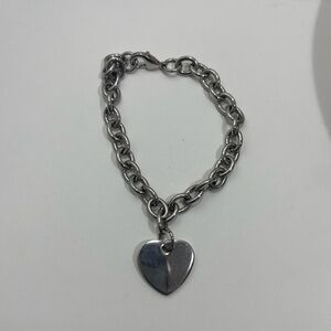 Stainless steel bracelet with heart charm